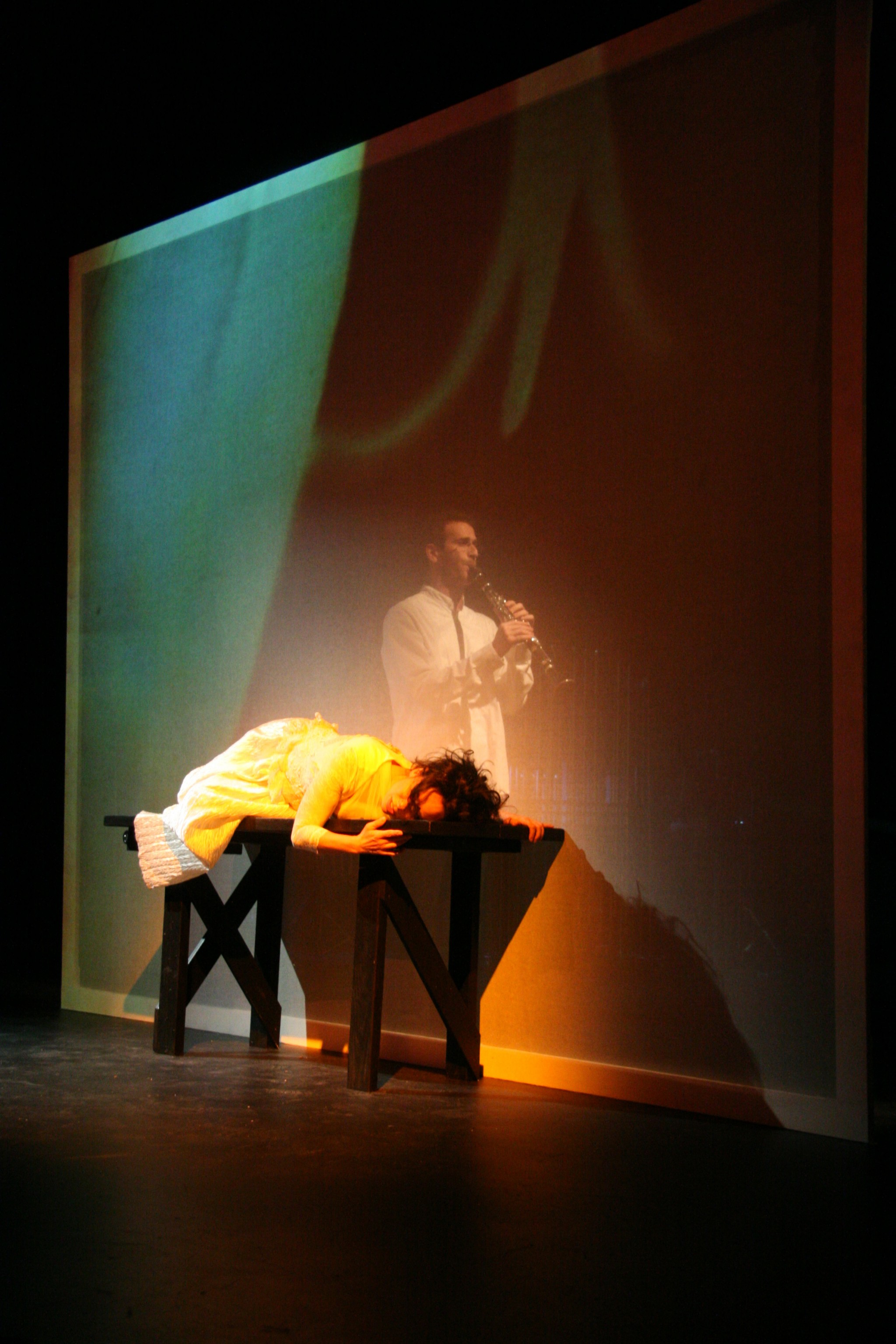The Dybbuk, live video multi-screen performance in Houston, Texas, 2009. Ofer Ben-Amots, composer/librettist; Jeremy Wilhelm, director; Misha Penton, soporano; Gilad Harel, clarinet.